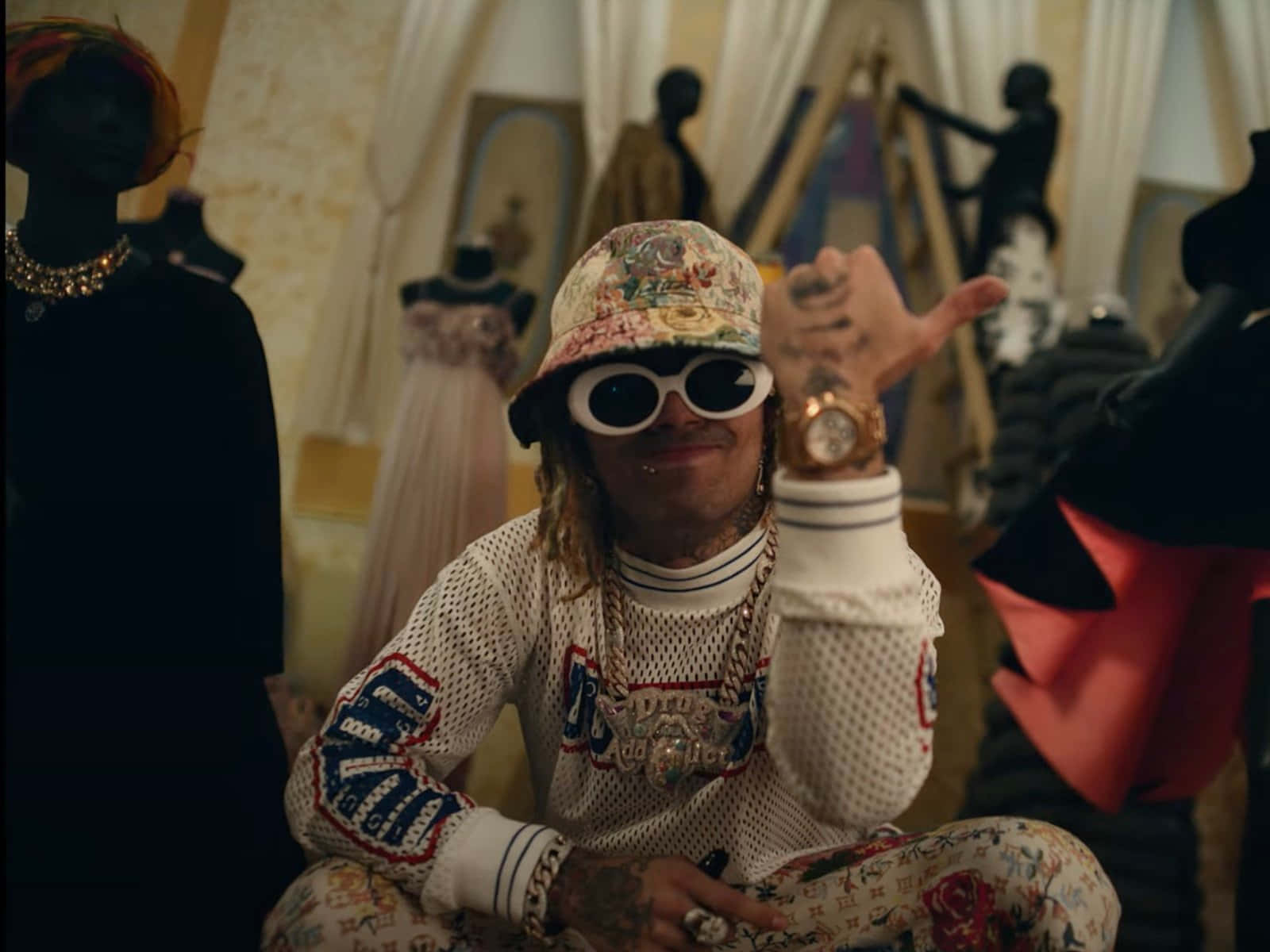 Lil Pump Posing For A Photoshoot. Background