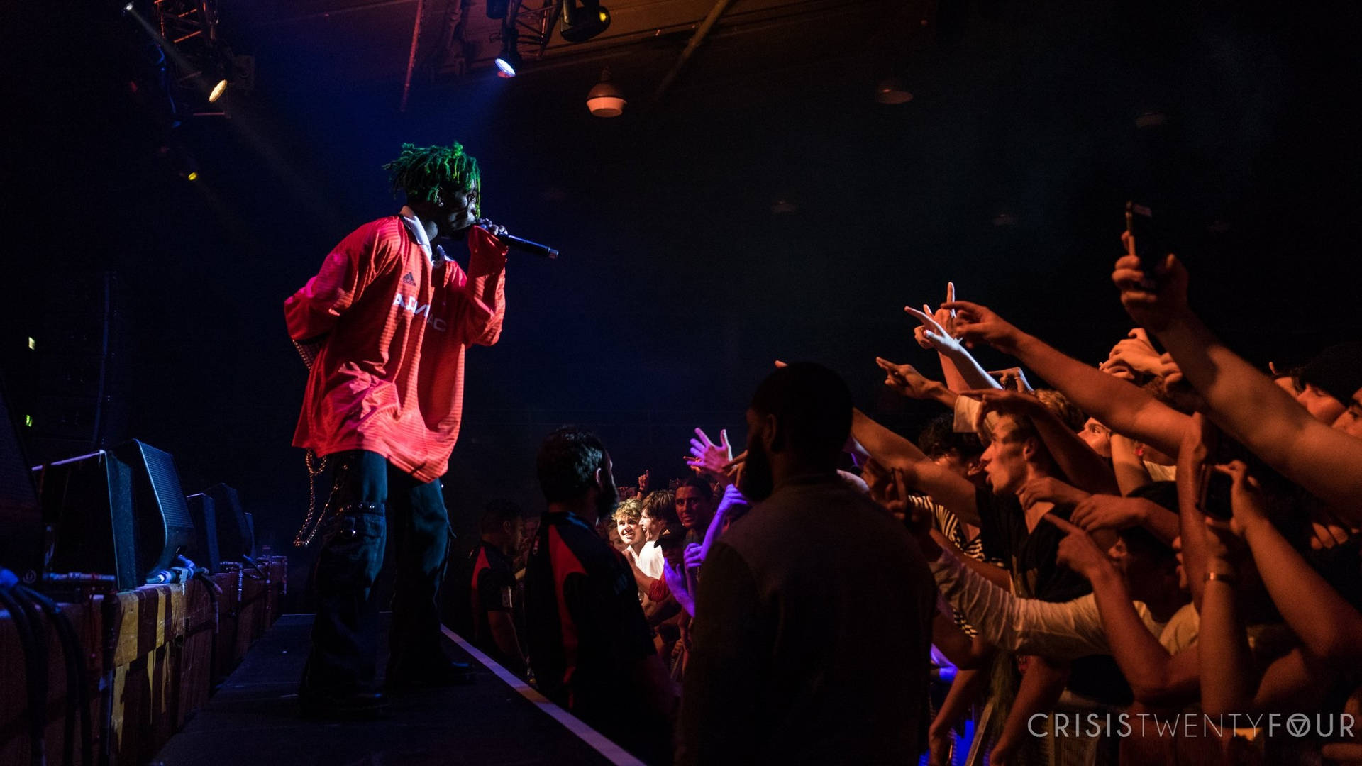 Lil Uzi Vert Laying Back On A Galaxy-patterned Desktop Background