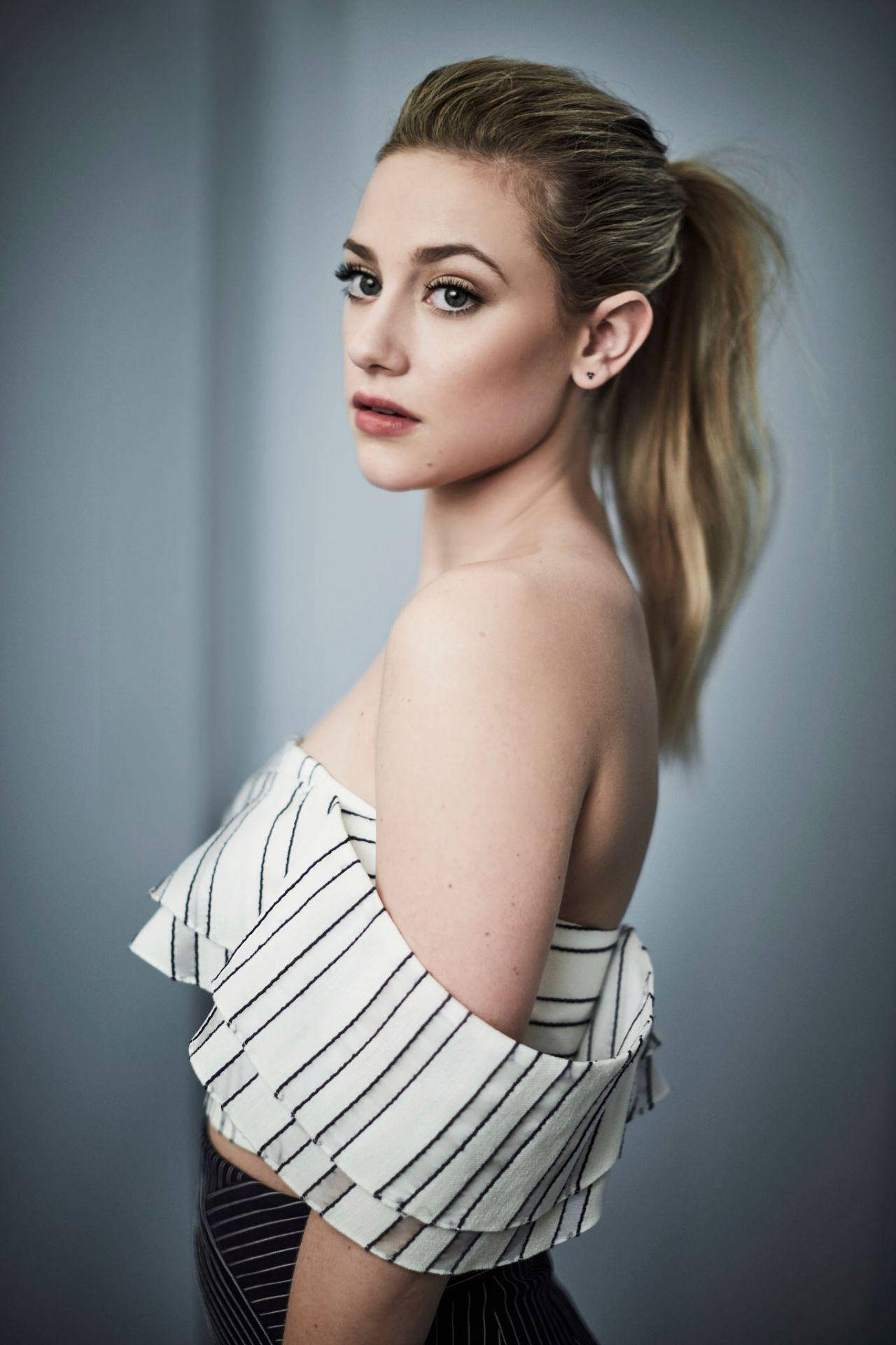 Lili Reinhart Side View Background