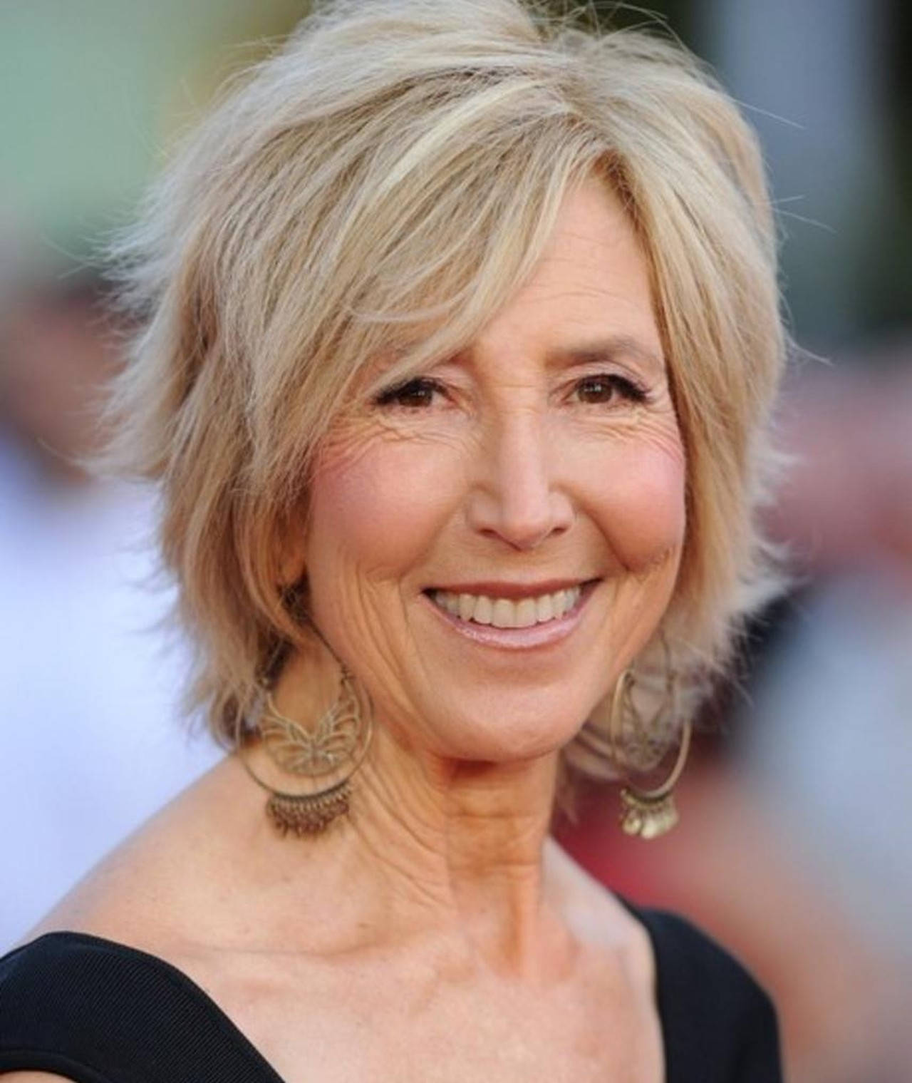 Lin Shaye In Black Outfit Background