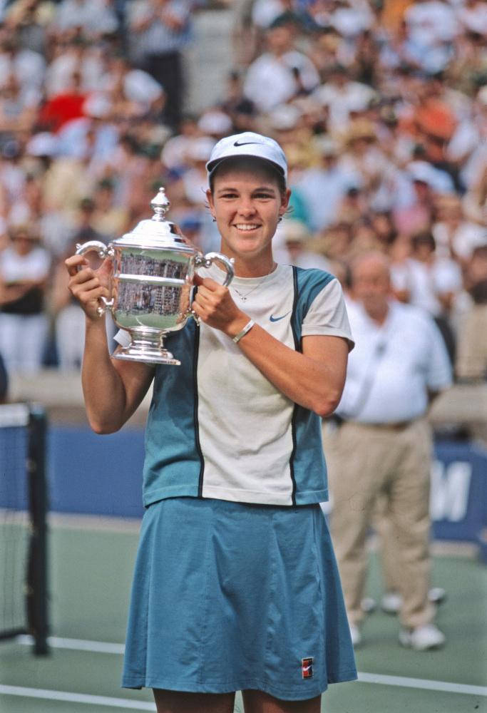 Lindsay Davenport Holding A Trophy Background