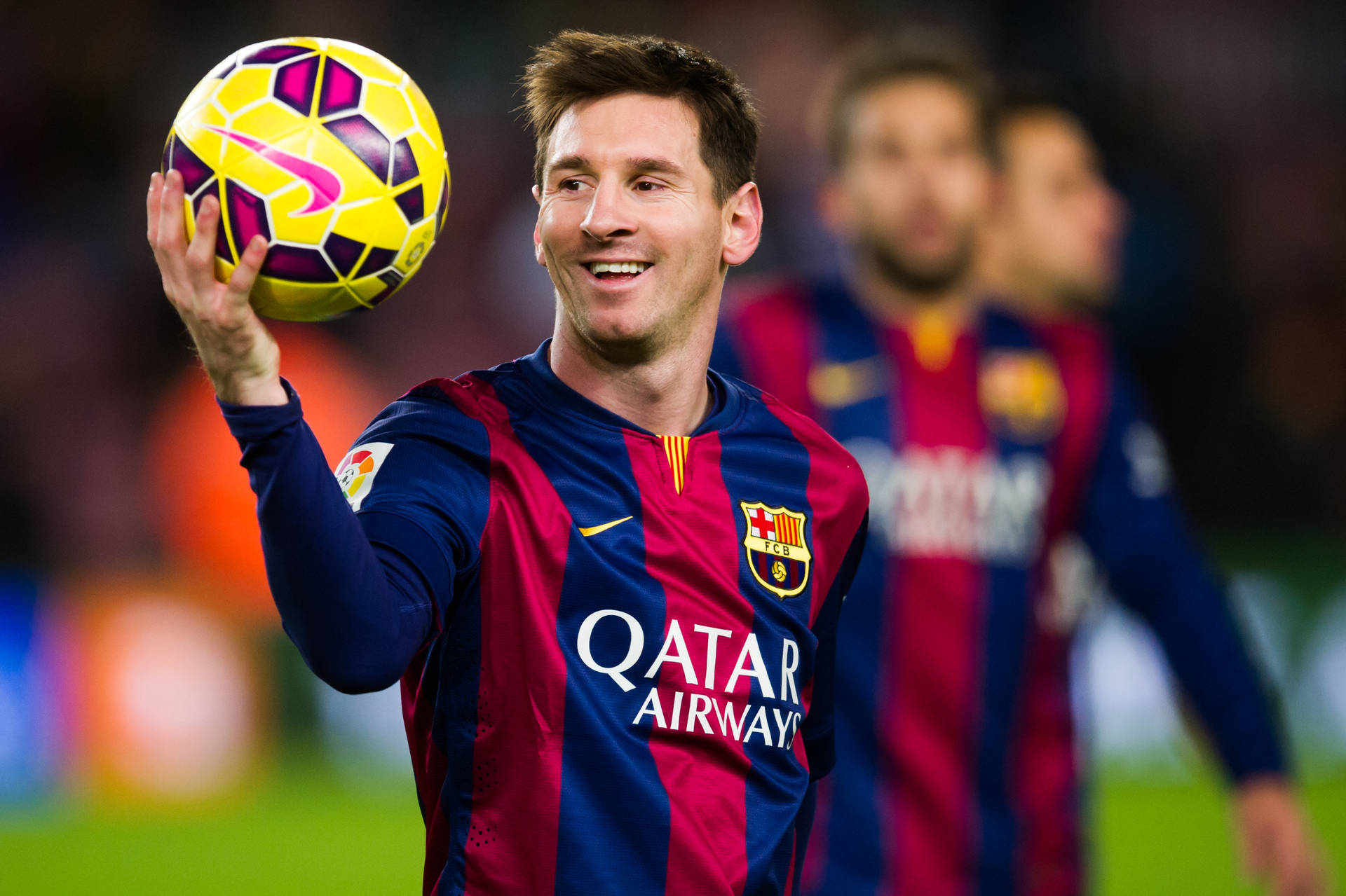 Lionel Messi Holding Yellow Ball Background