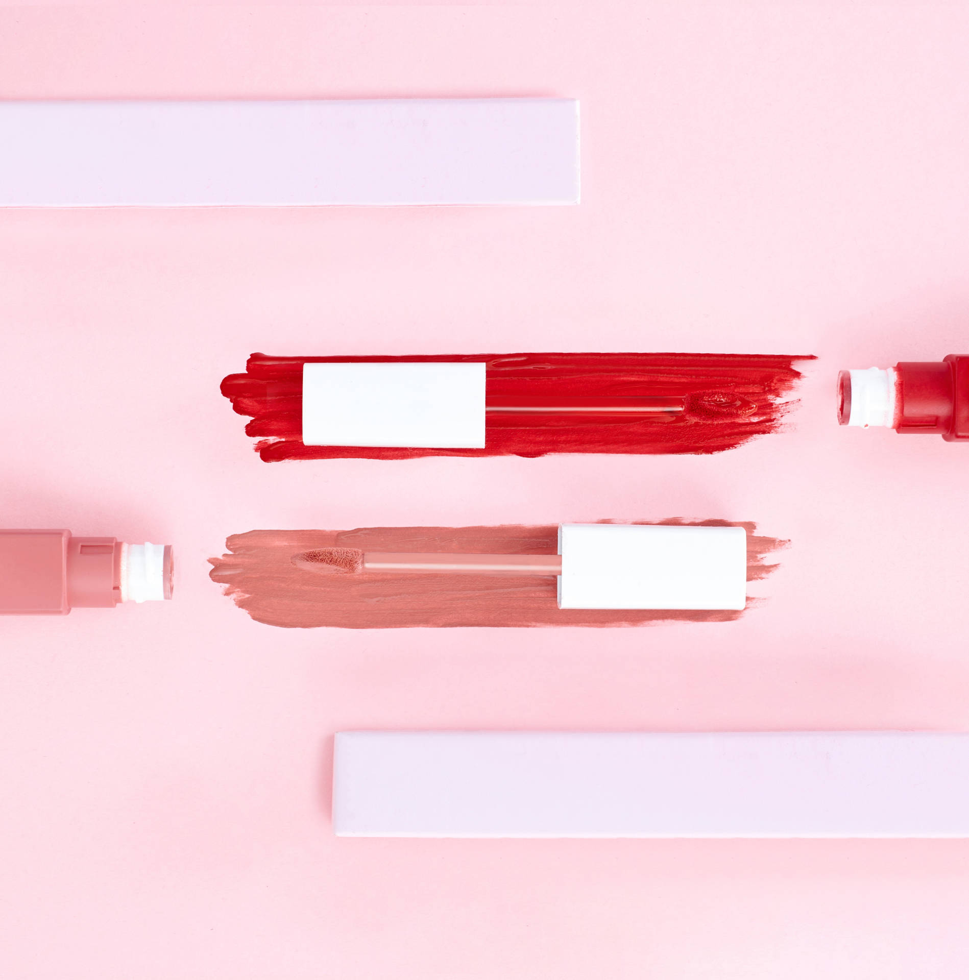 Lipsticks On Pink Background Background