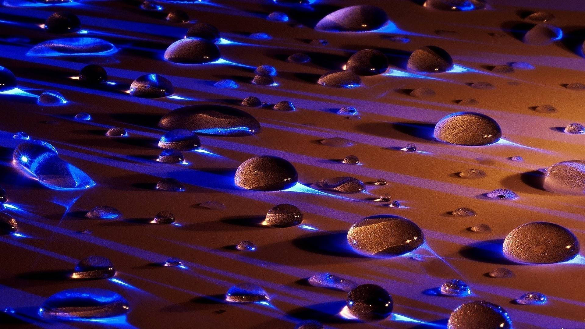 Liquid Blue Light Droplets Background