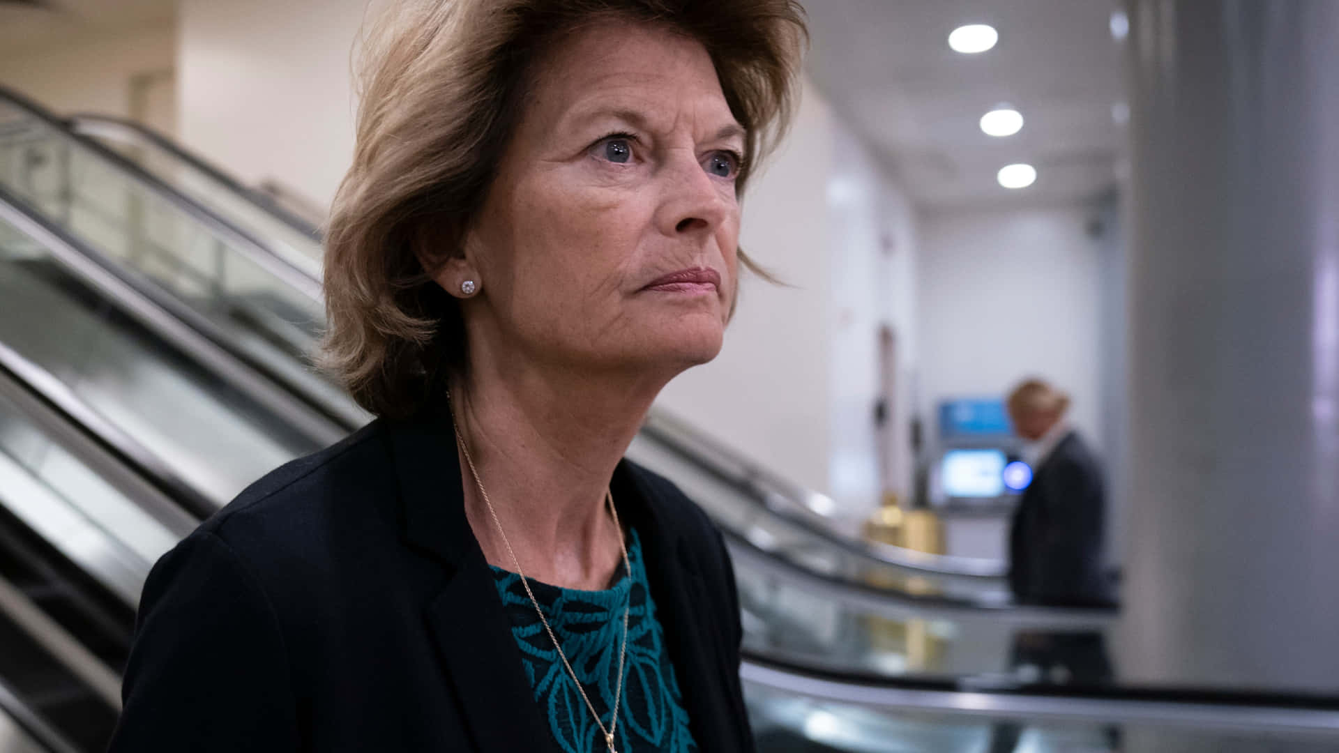 Lisa Murkowski Near Escalators Background