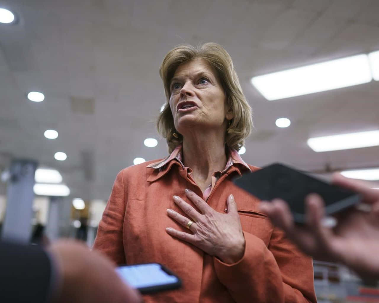 Lisa Murkowski Orange Clothing Background