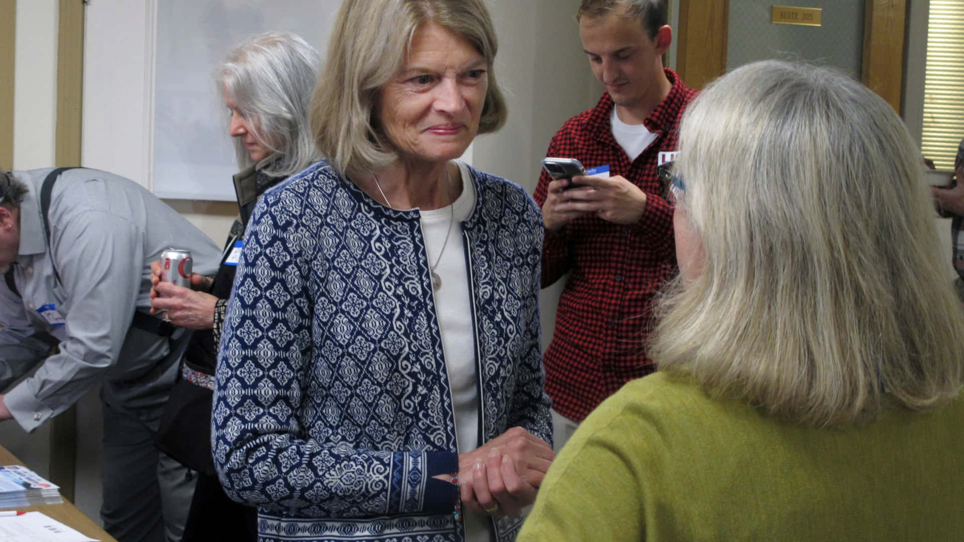 Lisa Murkowski Speaking With Old Women