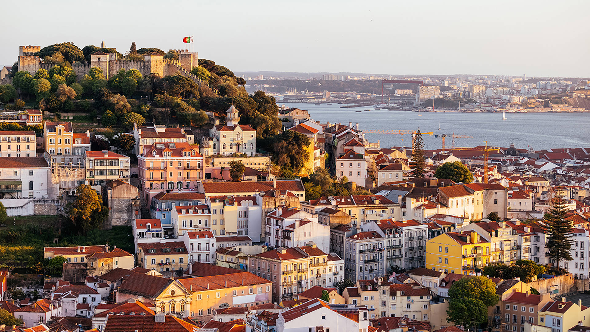 Lisbon's Houses On A Hill Background