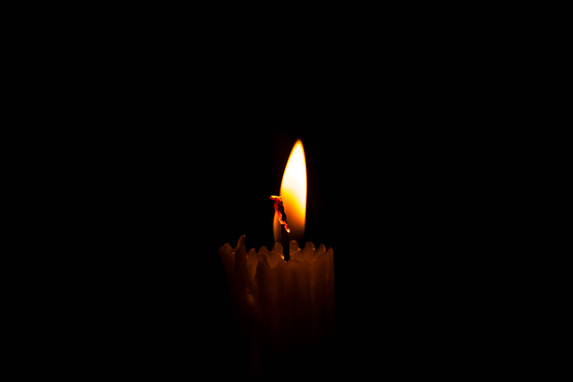 Lit Candle Dim Background