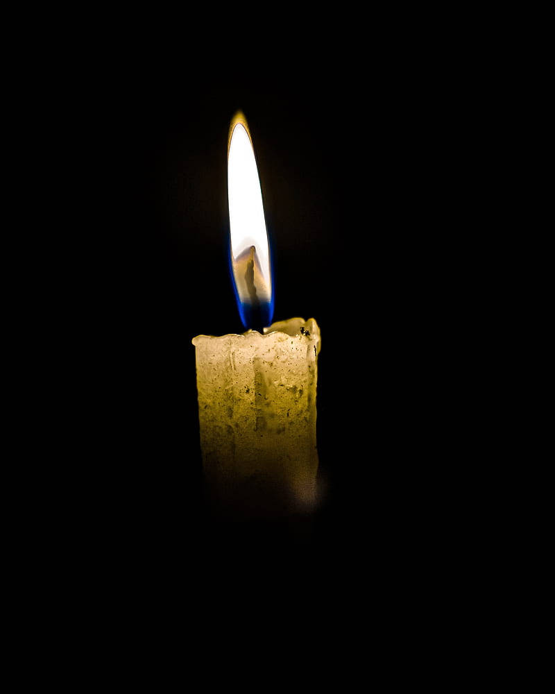 Lit Old Candle Condolence Background