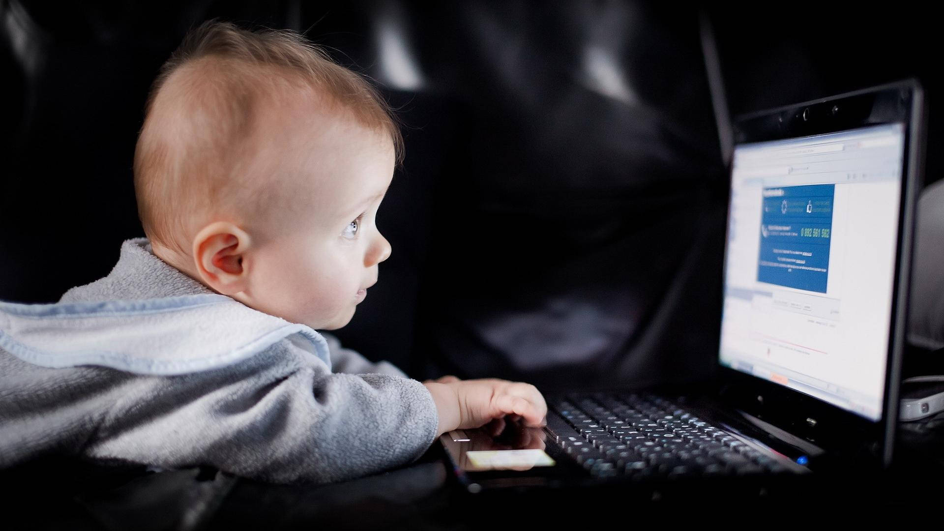 Little Ceo: Adorable Baby Commanding The Home Office Background