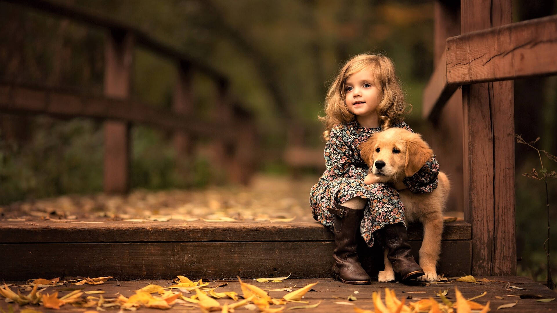 Little Girl With Golden Retriever Puppy Desktop