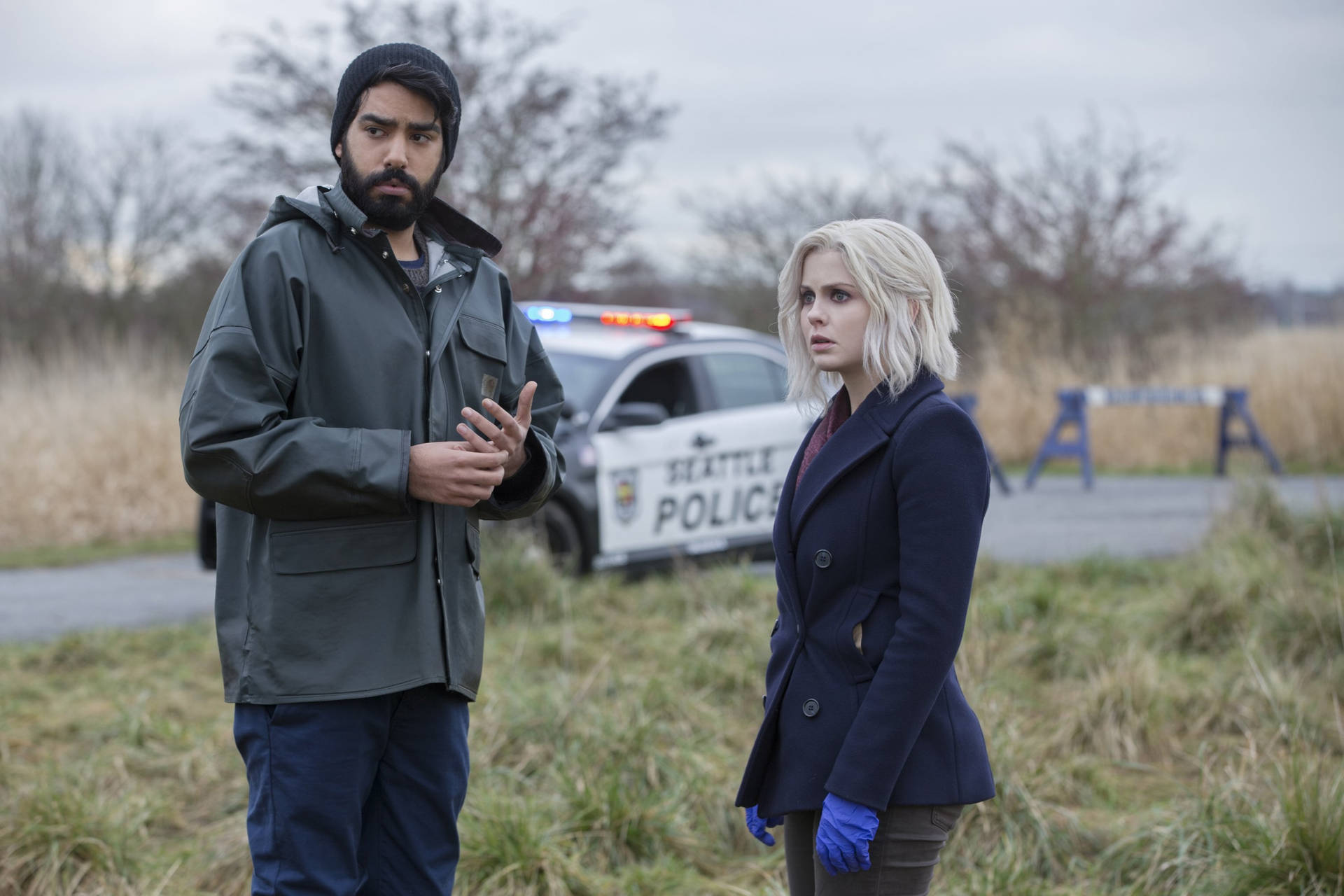 Liv Moore With Dr. Chakrabarti And The Police In Izombie Background