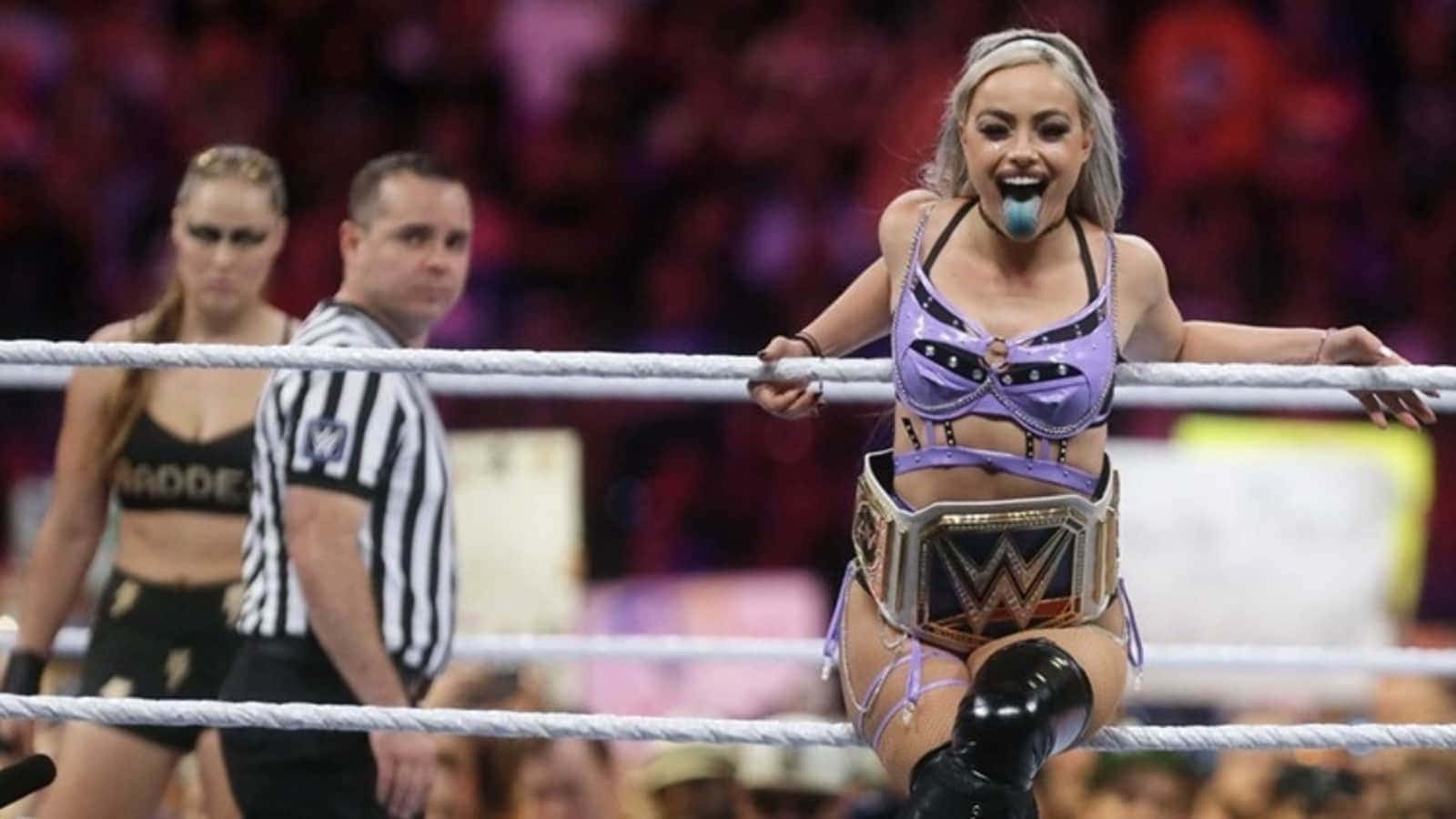 Liv Morgan Ronda Rousey Waiting In Ring Background