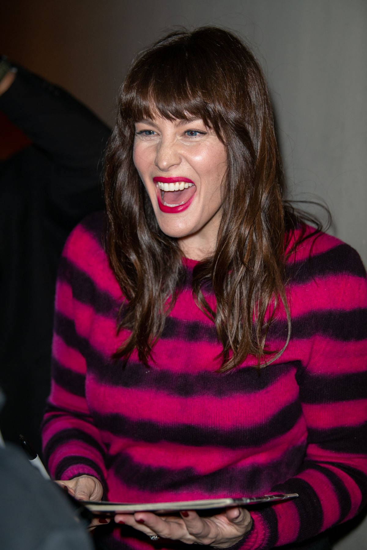 Liv Tyler Fuchsia & Black Stripy Sweater Background