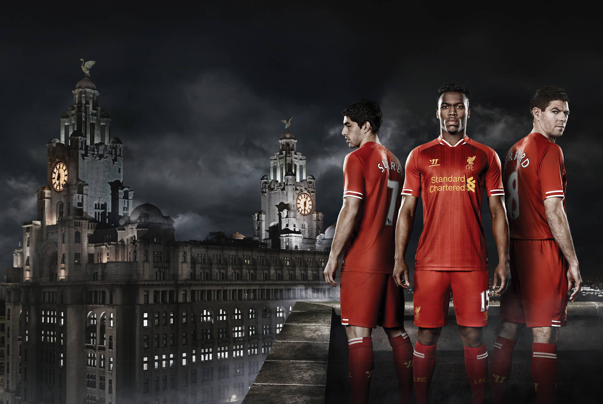 Liverpool Fc Players In Uniform Background