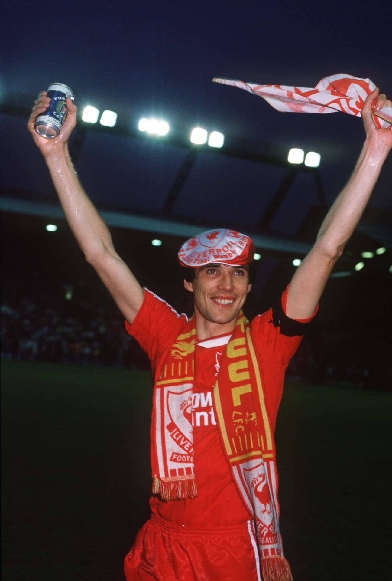 Liverpool Legend Alan Hansen Celebrating A Win Background