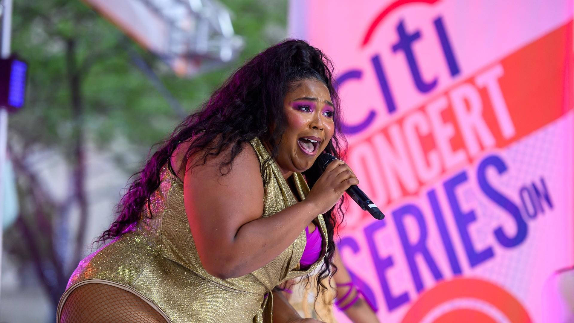 Lizzo In One-piece Suit Background