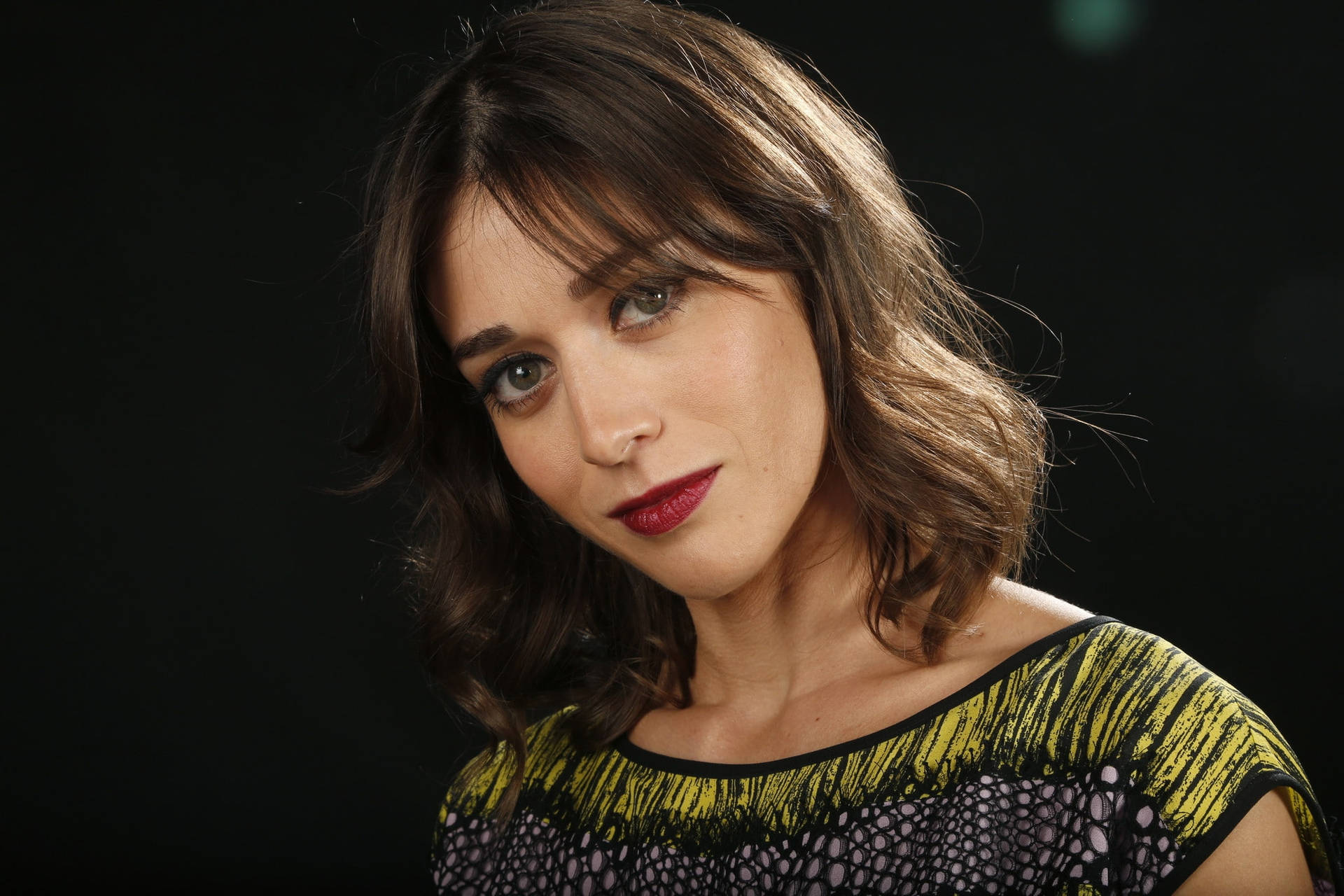 Lizzy Caplan Isolated On A Black Background Background