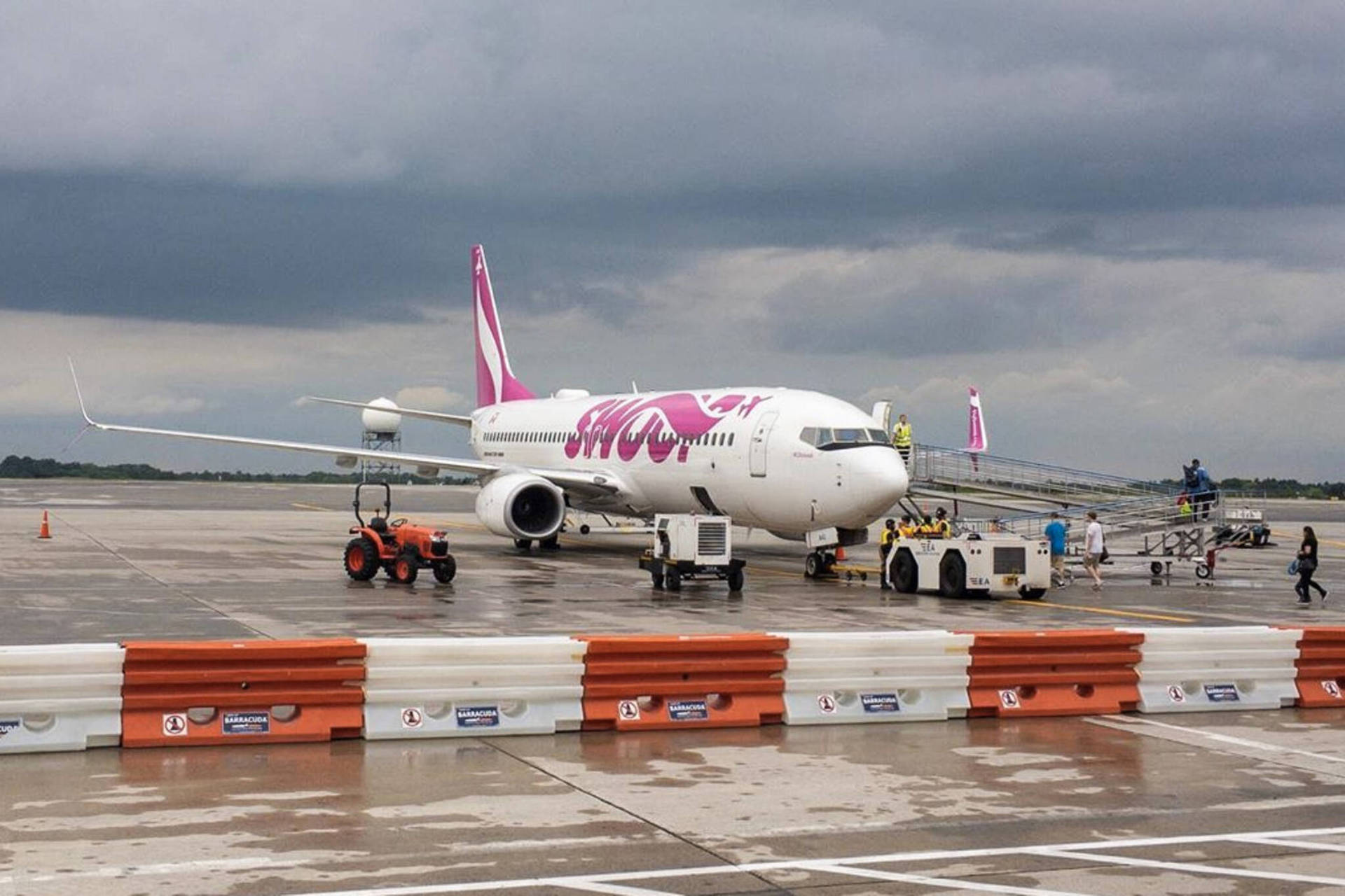 Loading Of Passengers Of Swoop Airlines Background