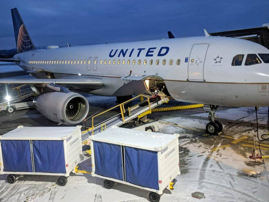 Loading White United Airlines Plane