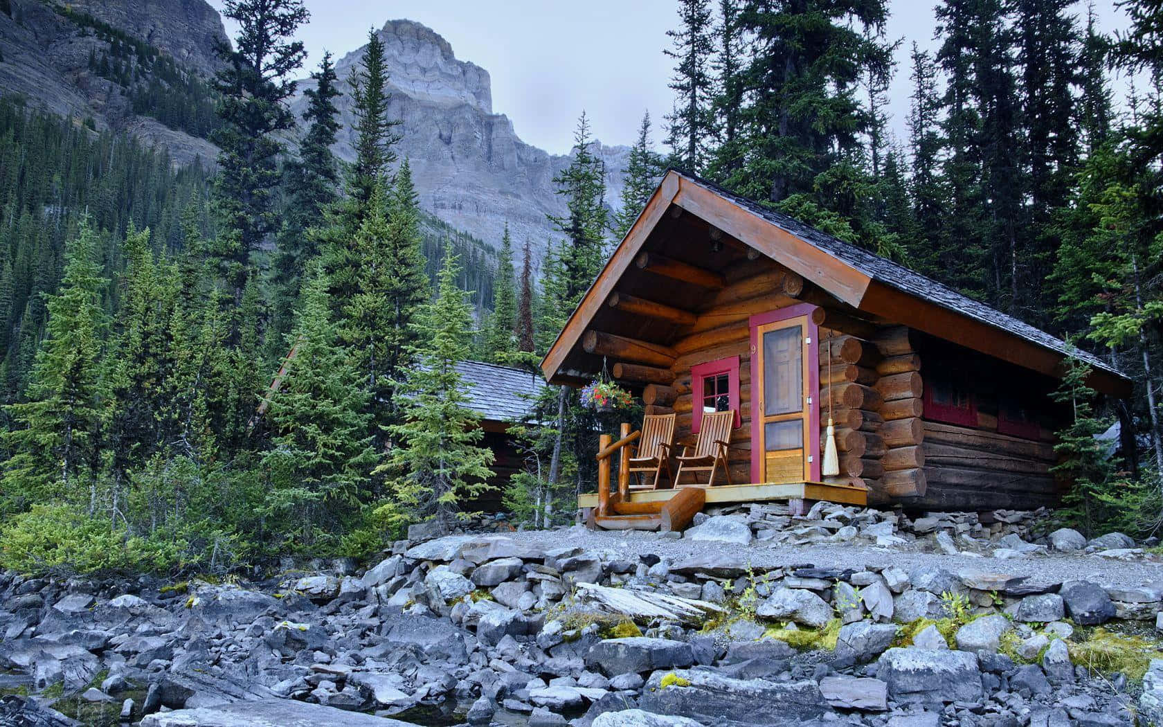 Log Cabin Placed On Rocks