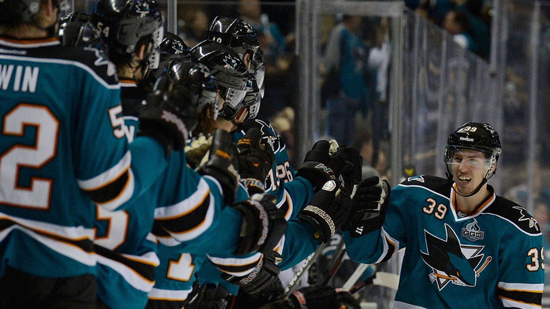 Logan Couture, Professional Ice Hockey Player, Celebrating A Great Play With A Fist Bump To His Teammates.