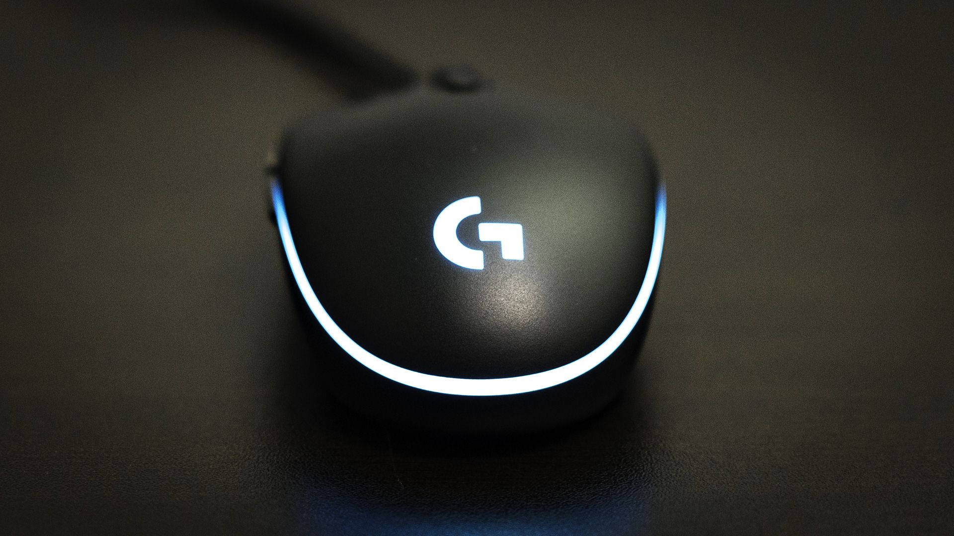 Logitech Mouse With Blue Light Background