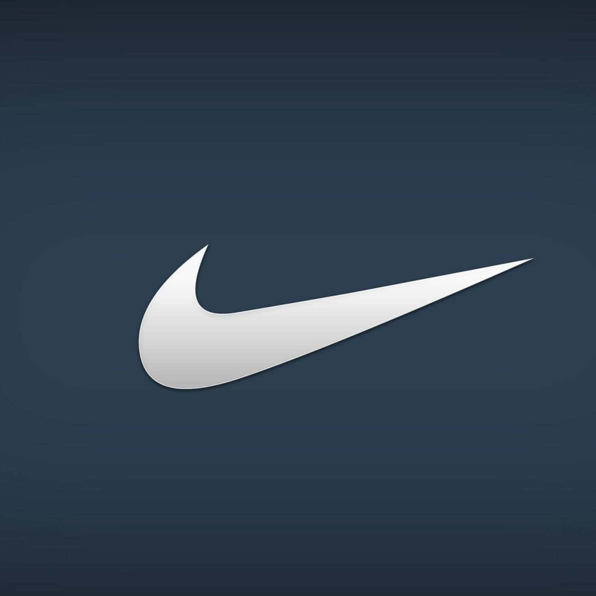 Logo Of Nike Featuring The Signature Swoosh In Bright Blue Background
