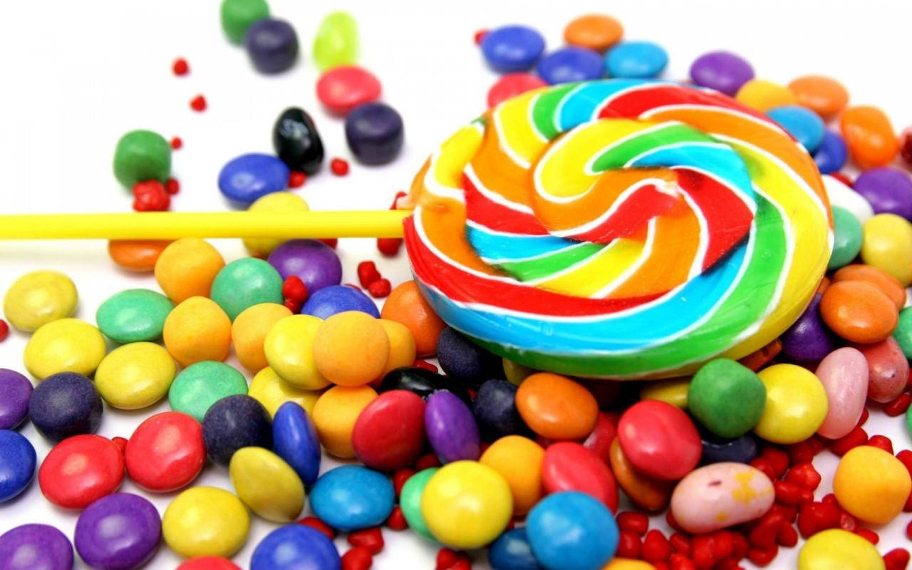 Lollipop And Nips Candies Background