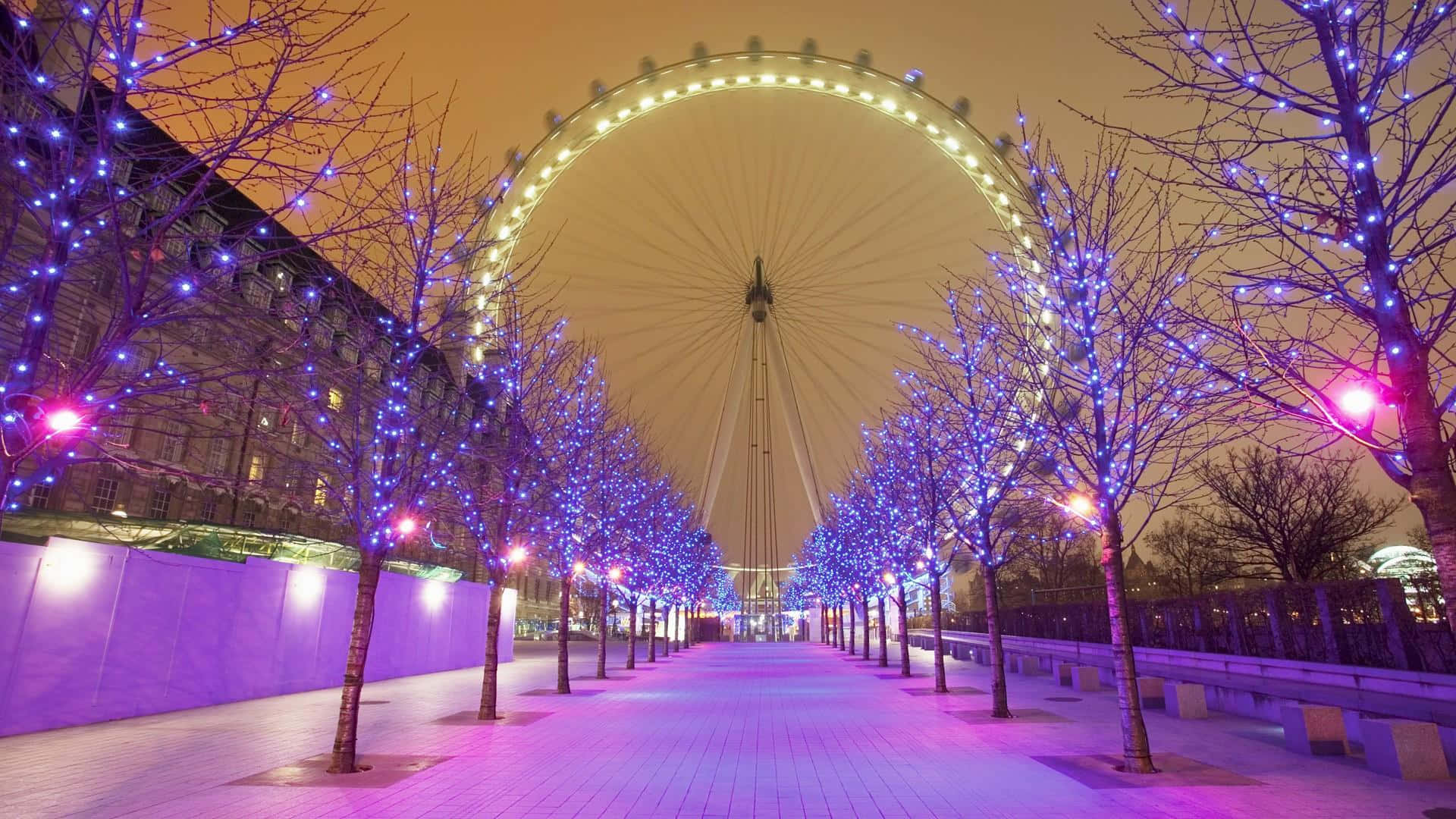 London Eye At Night With Lights Background