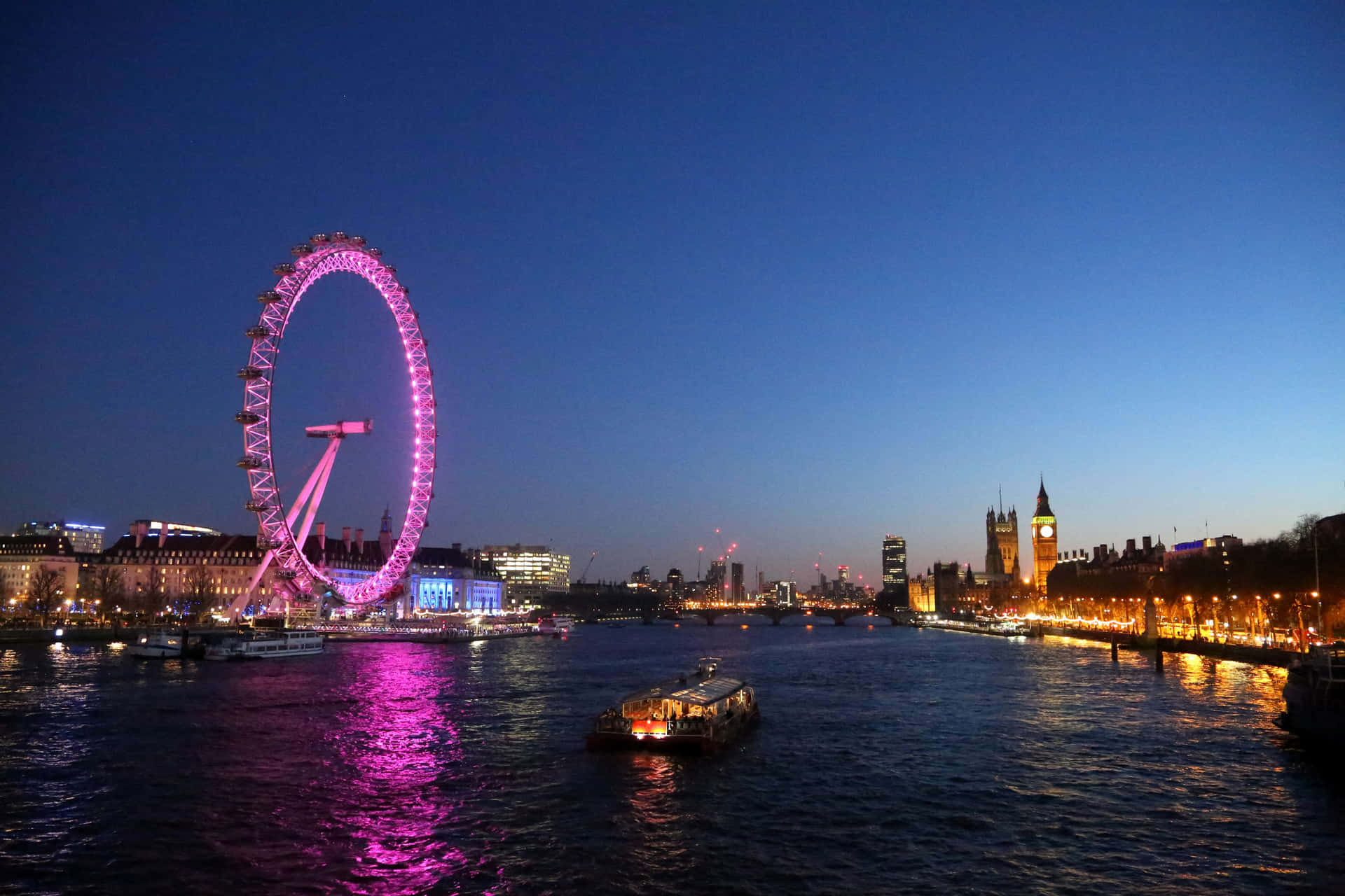 London Eye Gleaming In Purple Lights