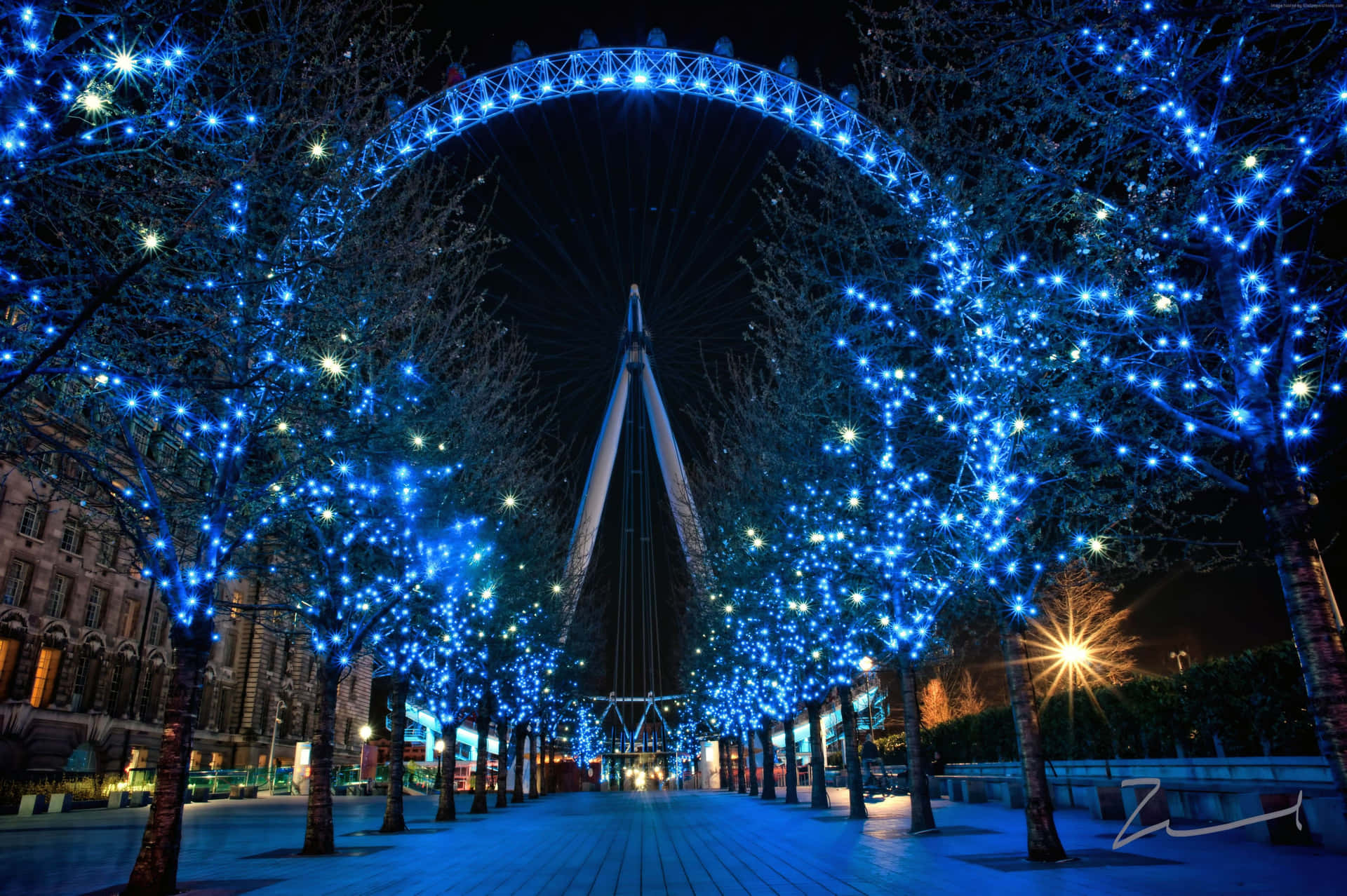 London Eye With Blue Lights For Christmas Season Background