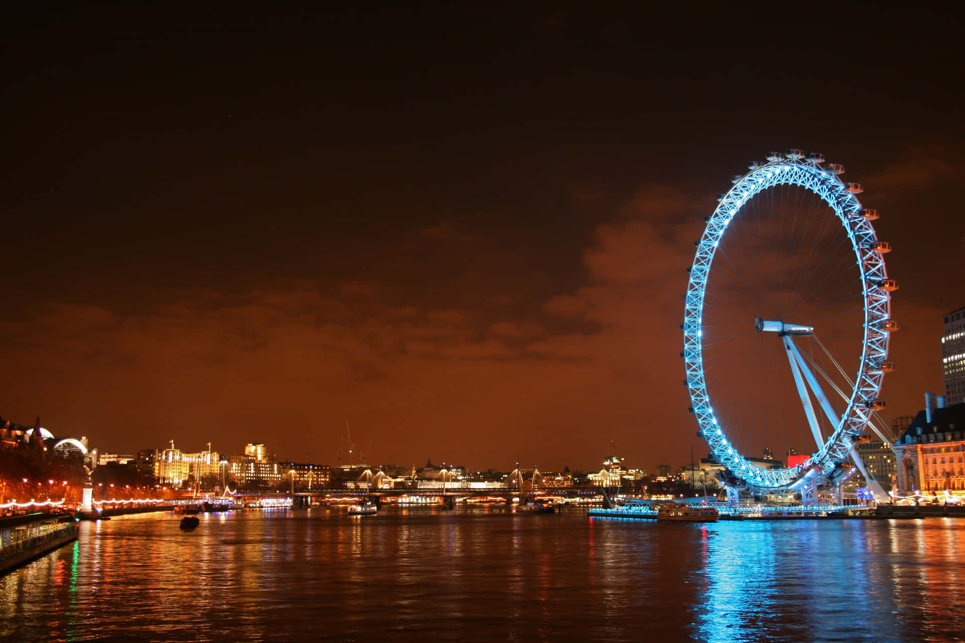 London Eye With Golden City Lights Background