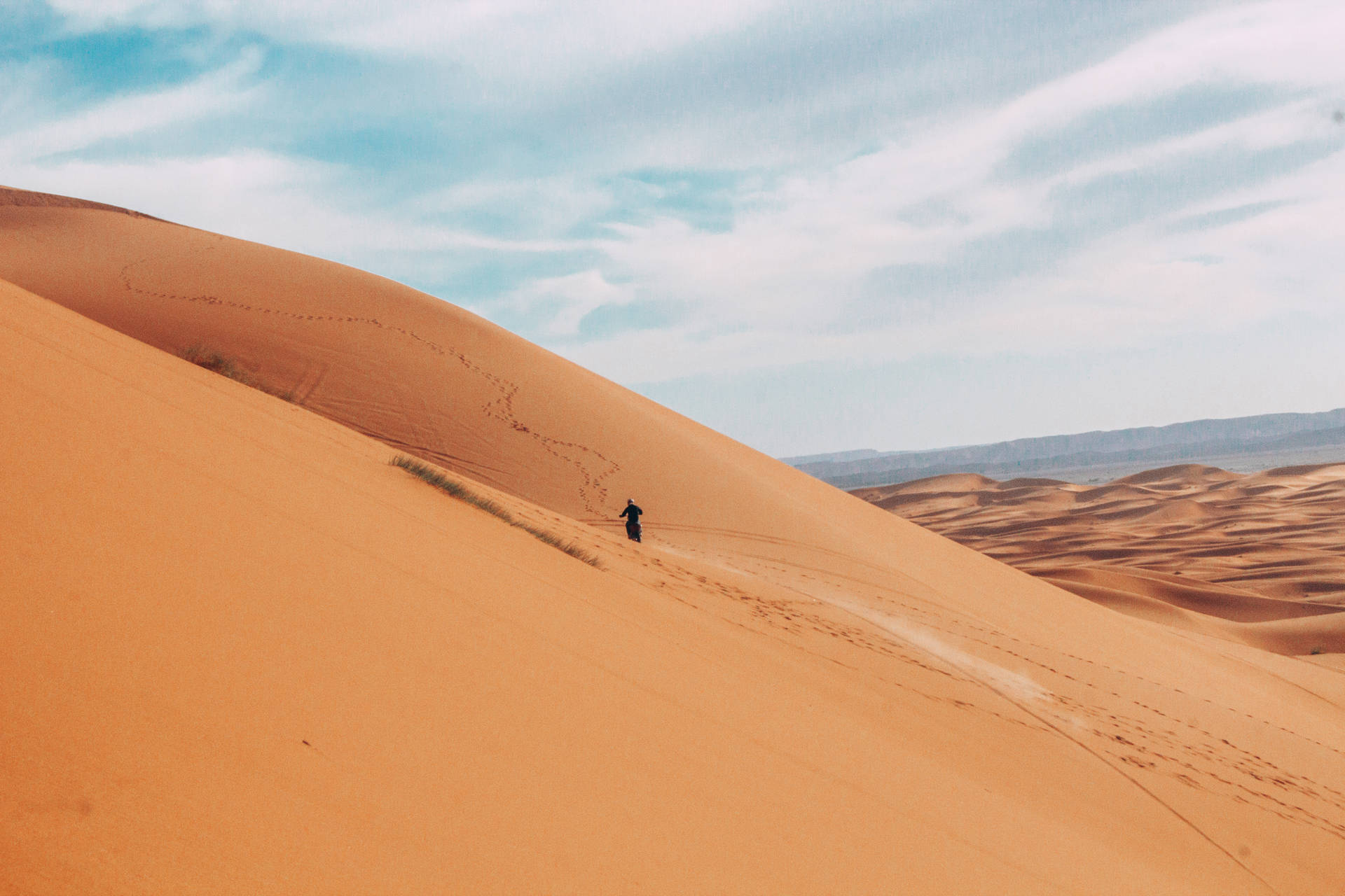 Lone Person In The Sahara Background