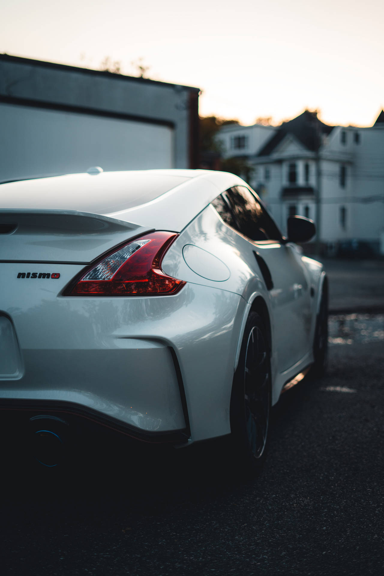 Look At The Sleek And Stylish Design Of The Nissan 370z Background