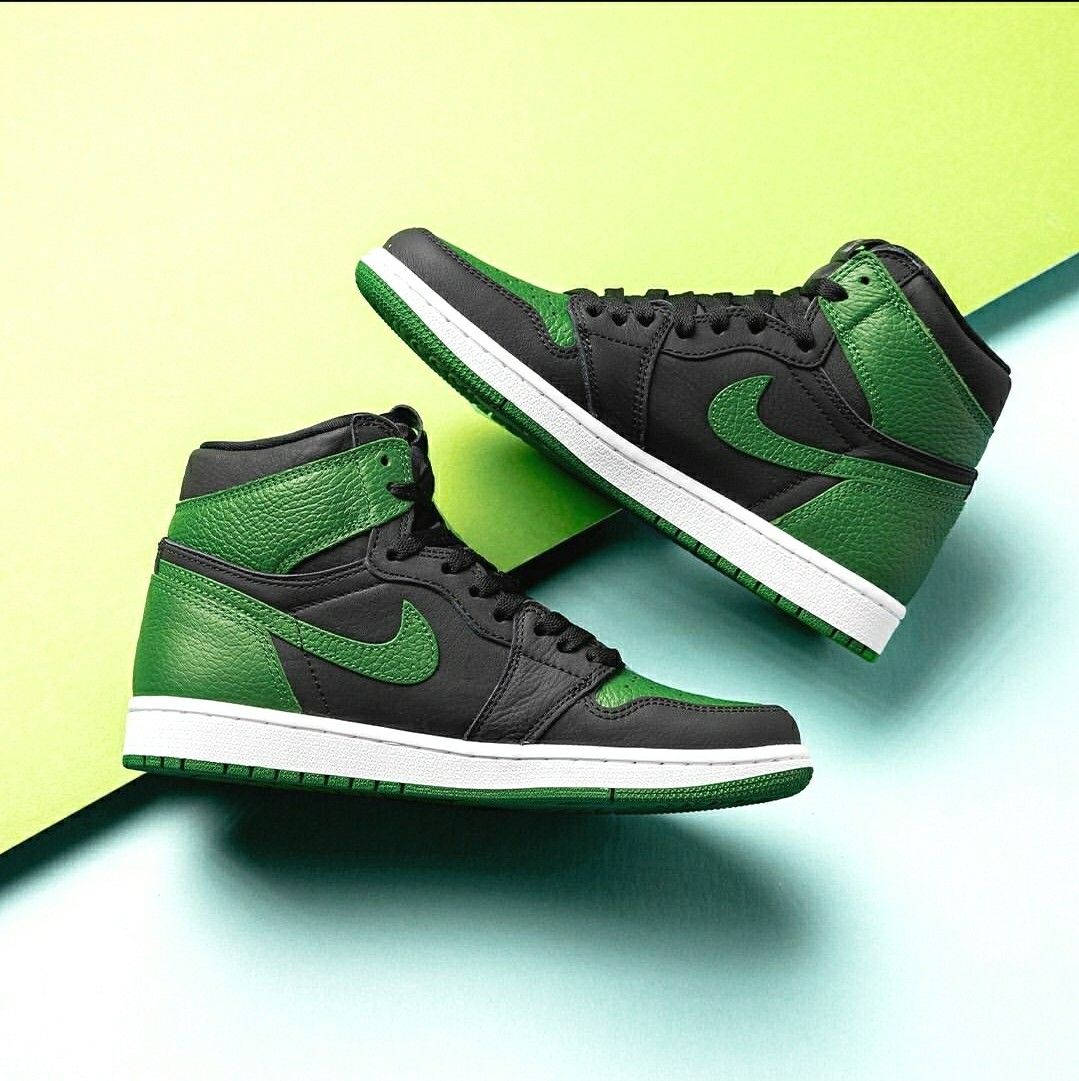 Look Stylish In A Pair Of Green Shoes. Background