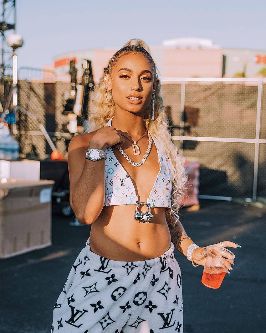 Looking Ever So Beautiful, Rising R&b And Latin Singer Danileigh Stands With Her Signature Style. Background