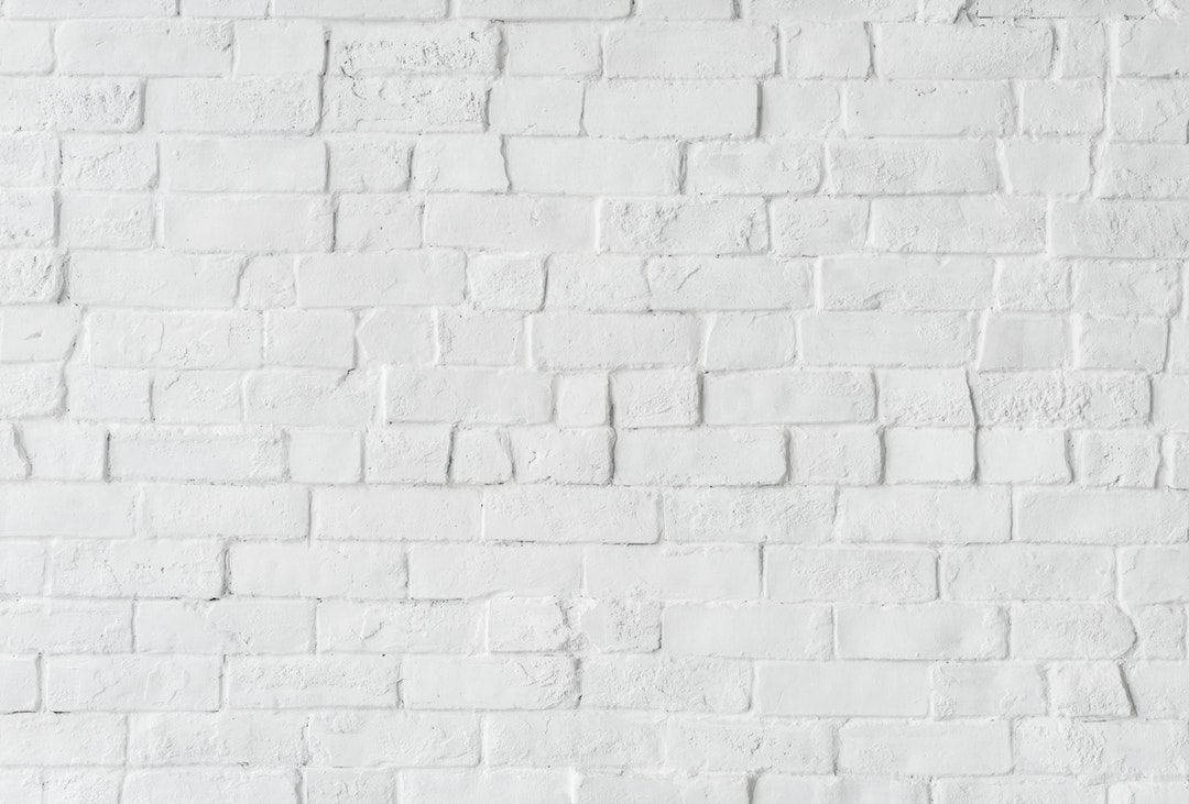 Lopsided White Brick Background