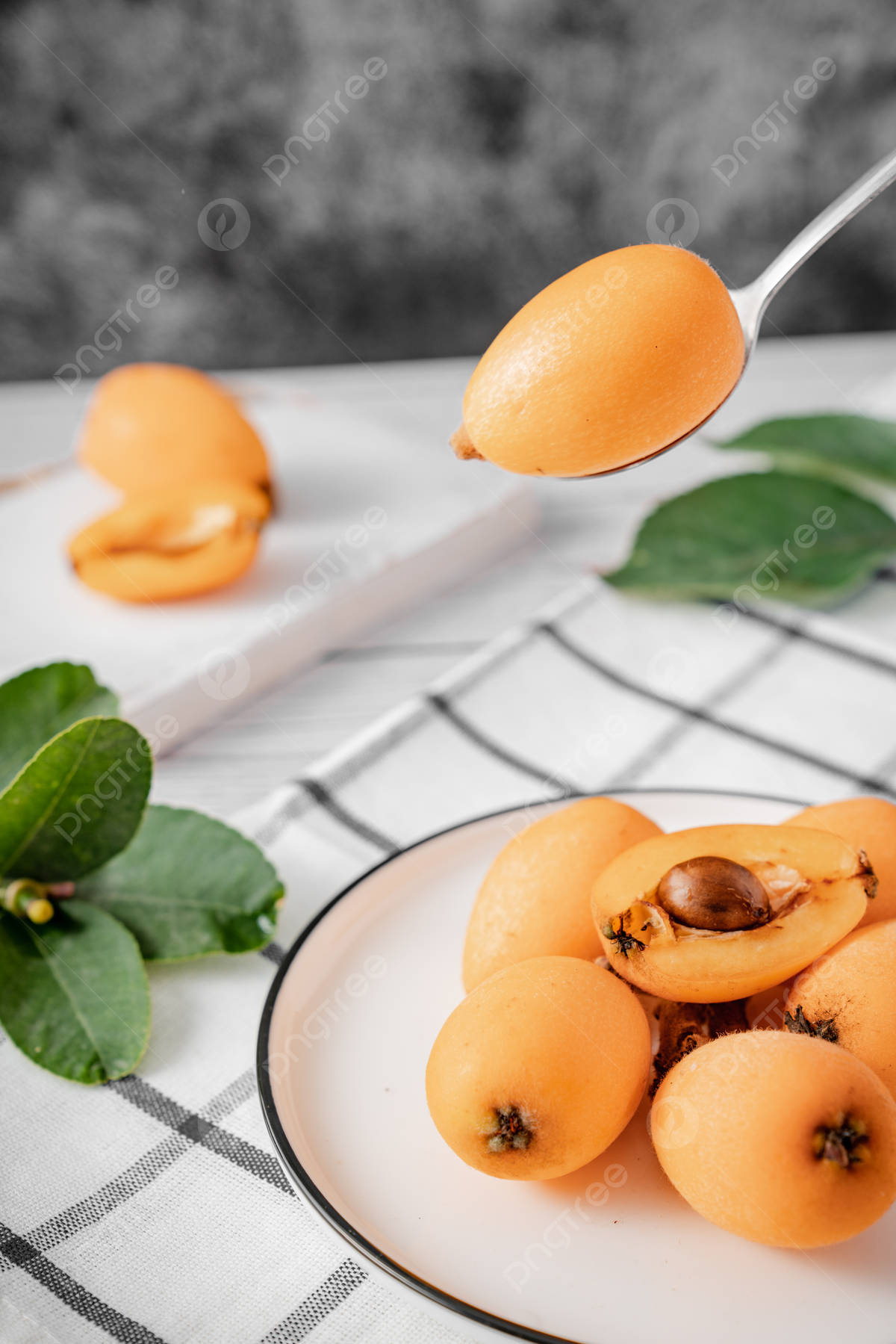 Loquat Fruit On Plate Background