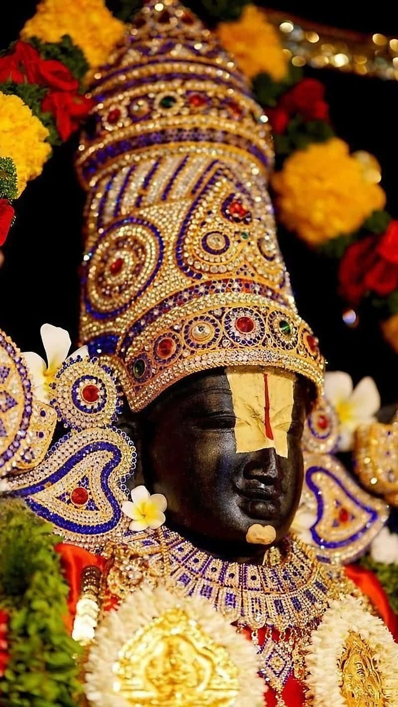 Lord Balaji Adornedin Jewelsand Flowers