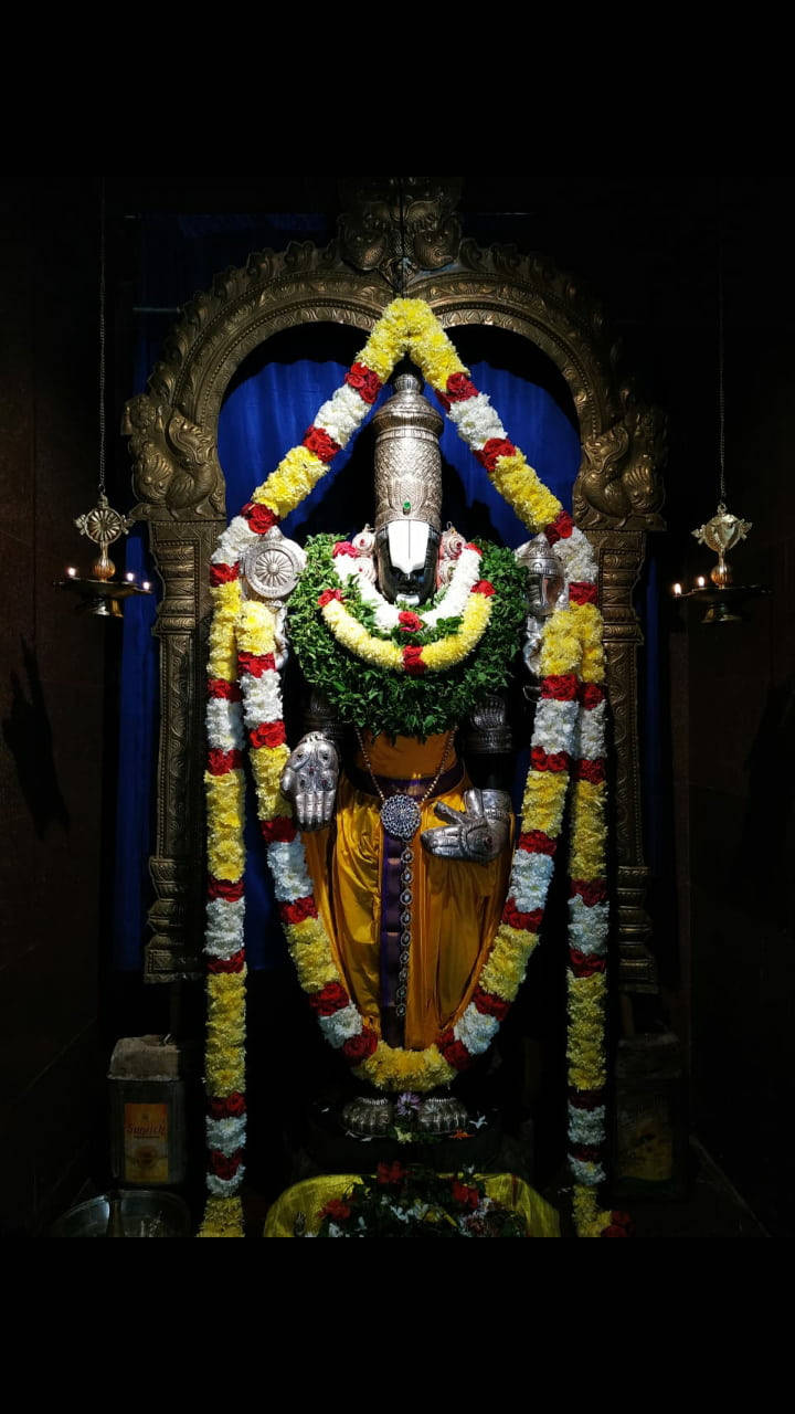 Lord Balaji Under Bronze Arch