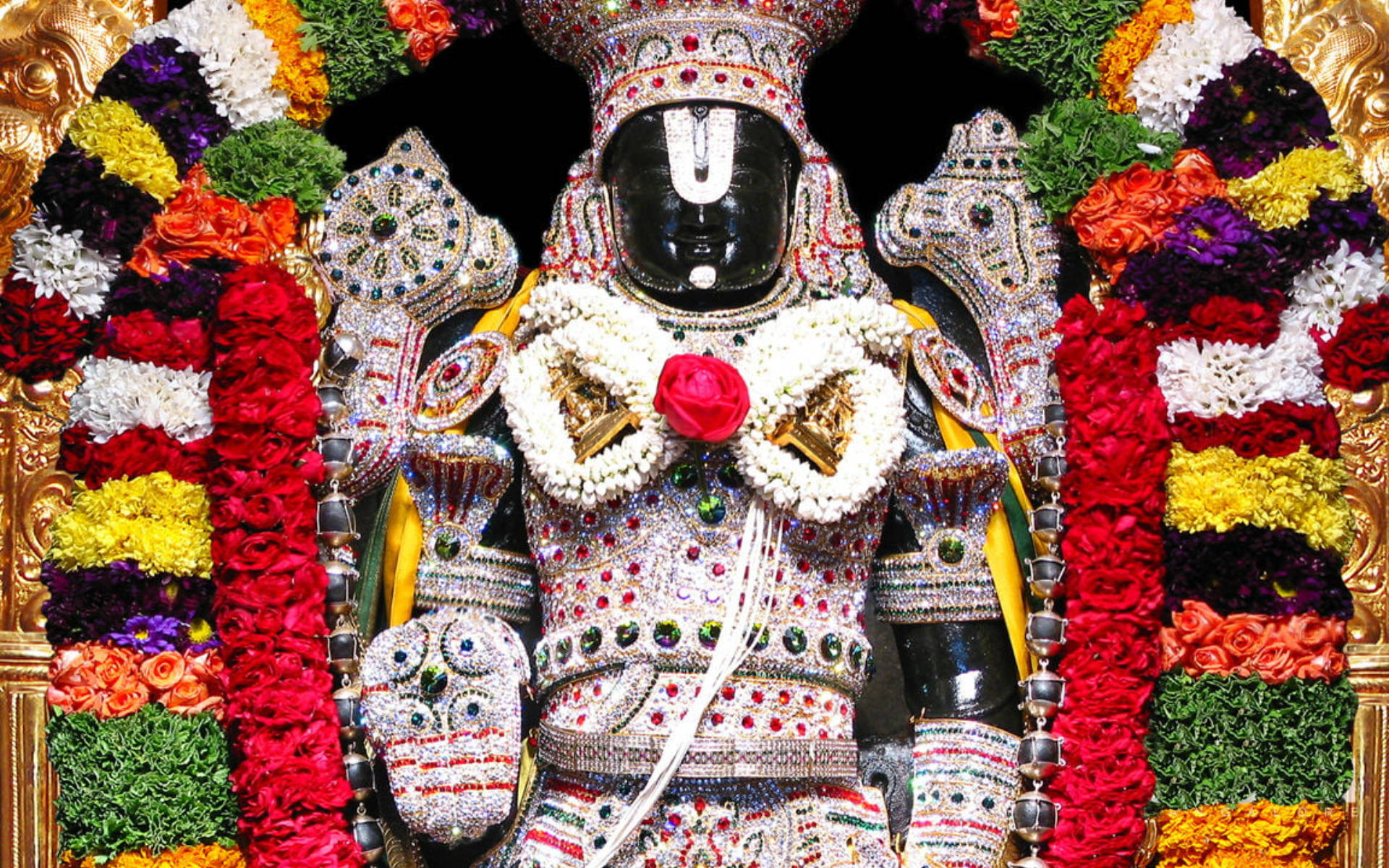 Lord Balaji With Floral Garlands Background