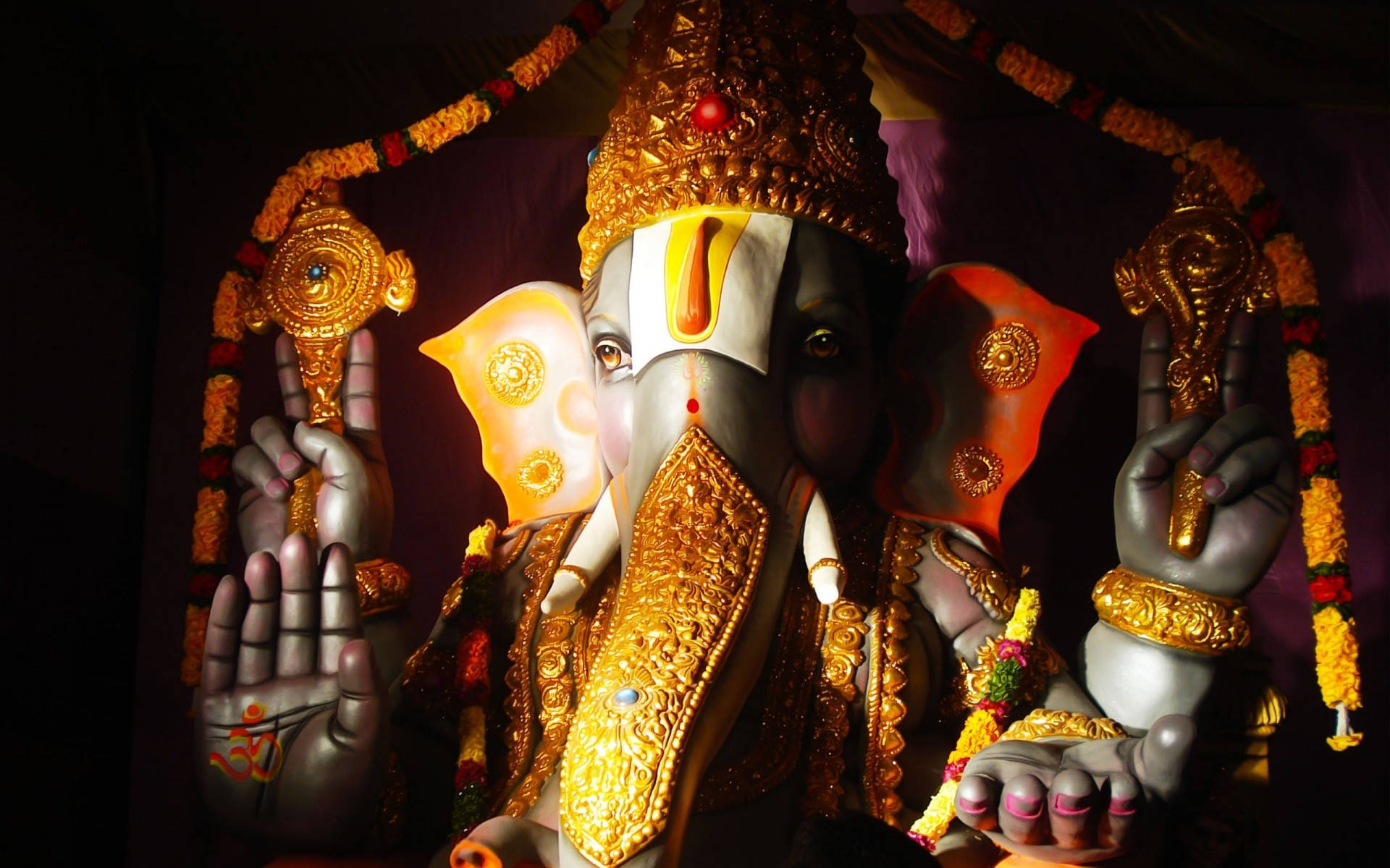 Lord Ganesha With Golden Accessories Background