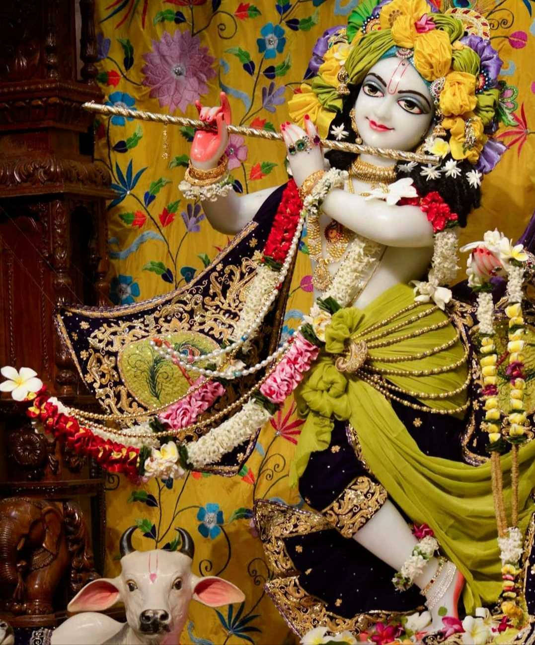Lord Krishna's Sculpture As An Iskcon Tribute Background