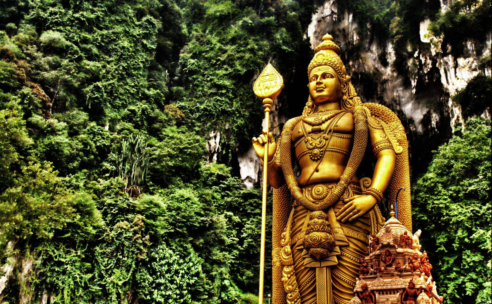 Lord Murugan 4k Statue With Trees Background