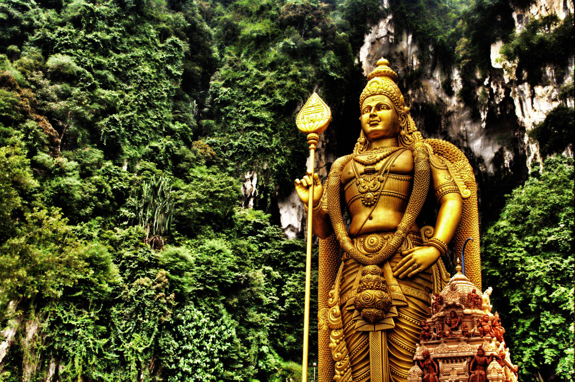 Lord Murugan Statue Surrounded By Trees