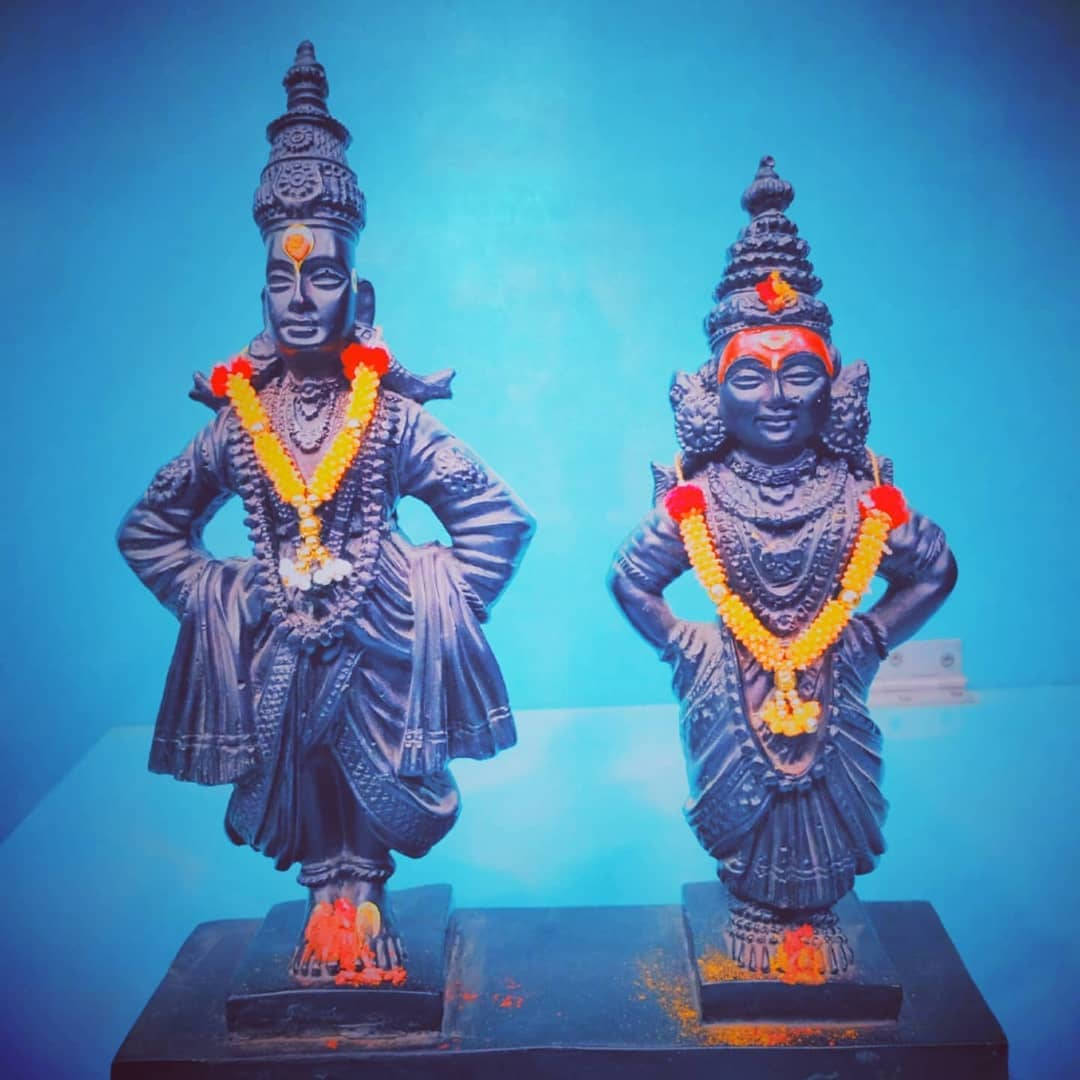 Lord Pandurang And Rukmini Statues With Garlands
