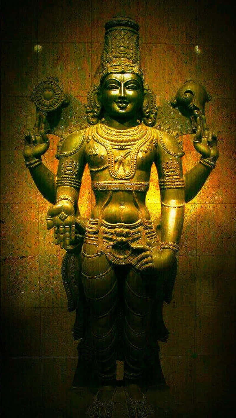 Lord_ Perumal_ Statue_ Golden_ Hue Background