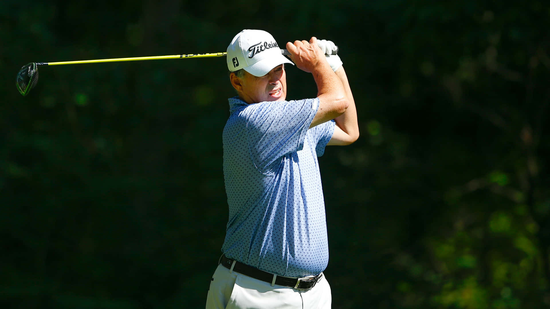 Loren Roberts Arms In Follow-through Position Background